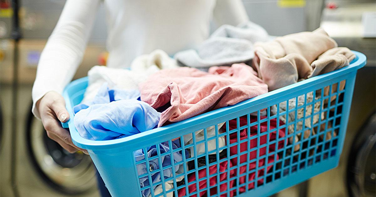 144871921 l 2015 woman holding laundry basket web