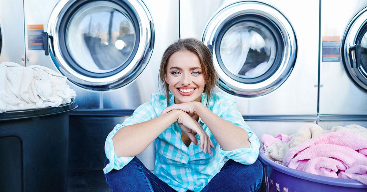 159725200 l 2015 woman sitting in front of washer web