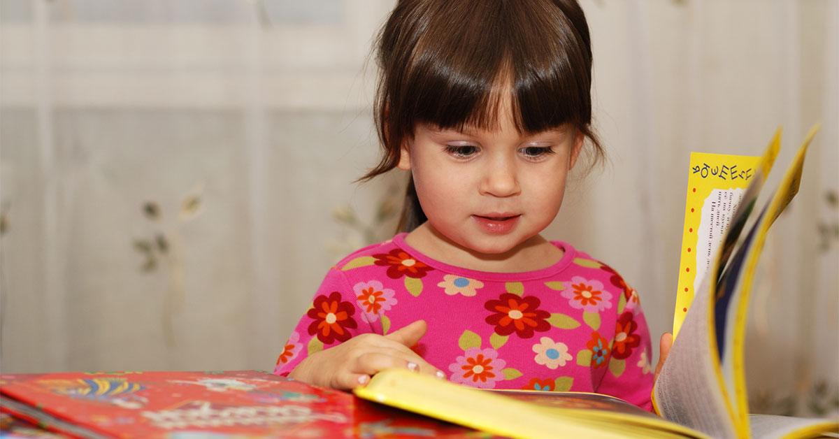 3404 12882 young girl reading book web