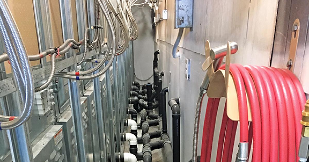 water hose at Duds in the Suds Coin Laundry