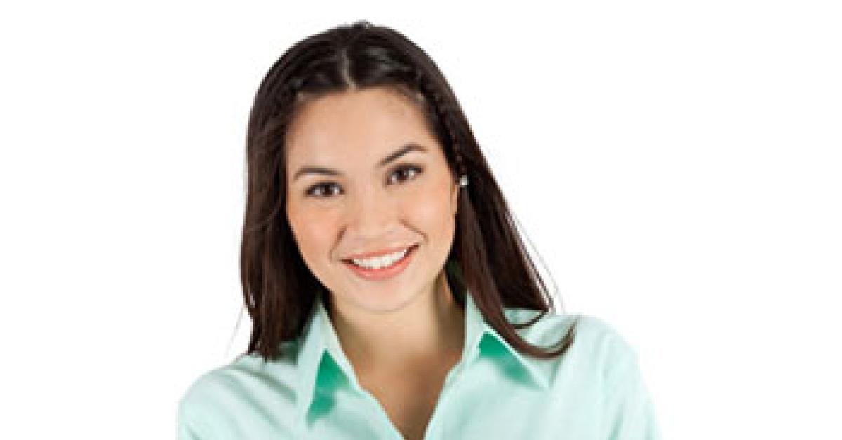 woman holding folded laundry image