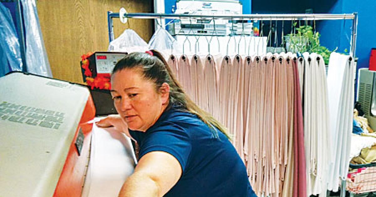 ironer at new wave laundromat web