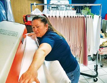 ironer at new wave laundromat web